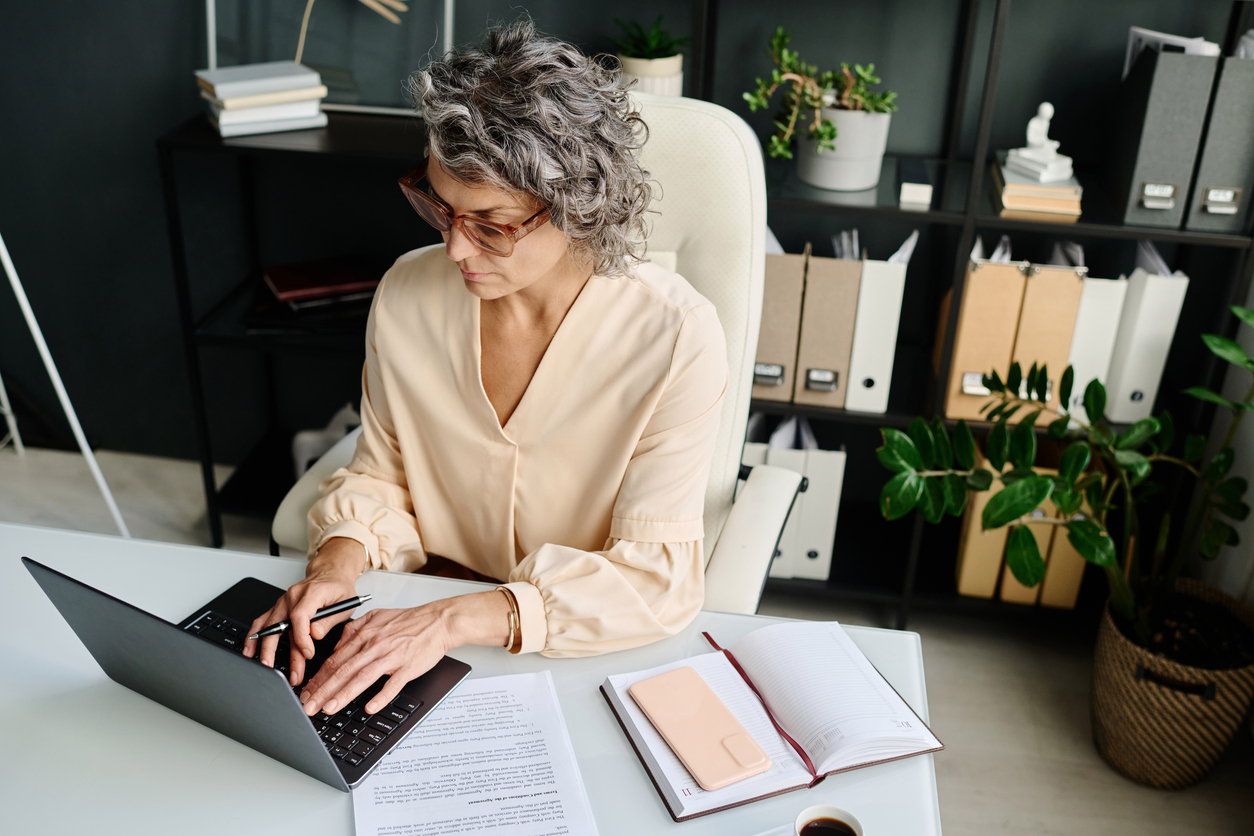 A woman looking up 401(k) contribution limits.