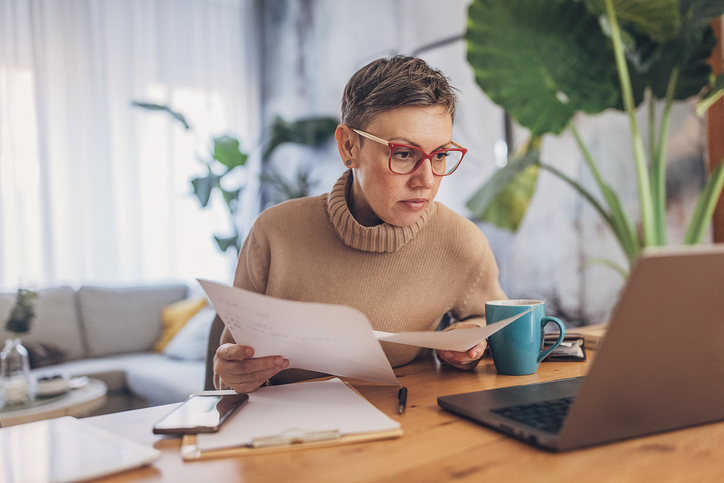 A woman looking up exceptions to WEP and GPO. 