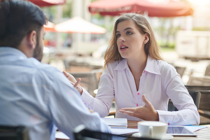 A financial advisor reviewing a retirement plan with a client.