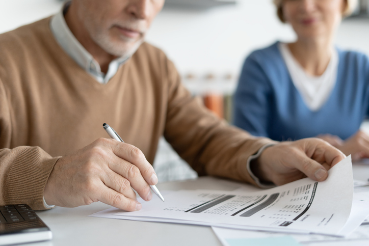 A couple reviewing their taxes.